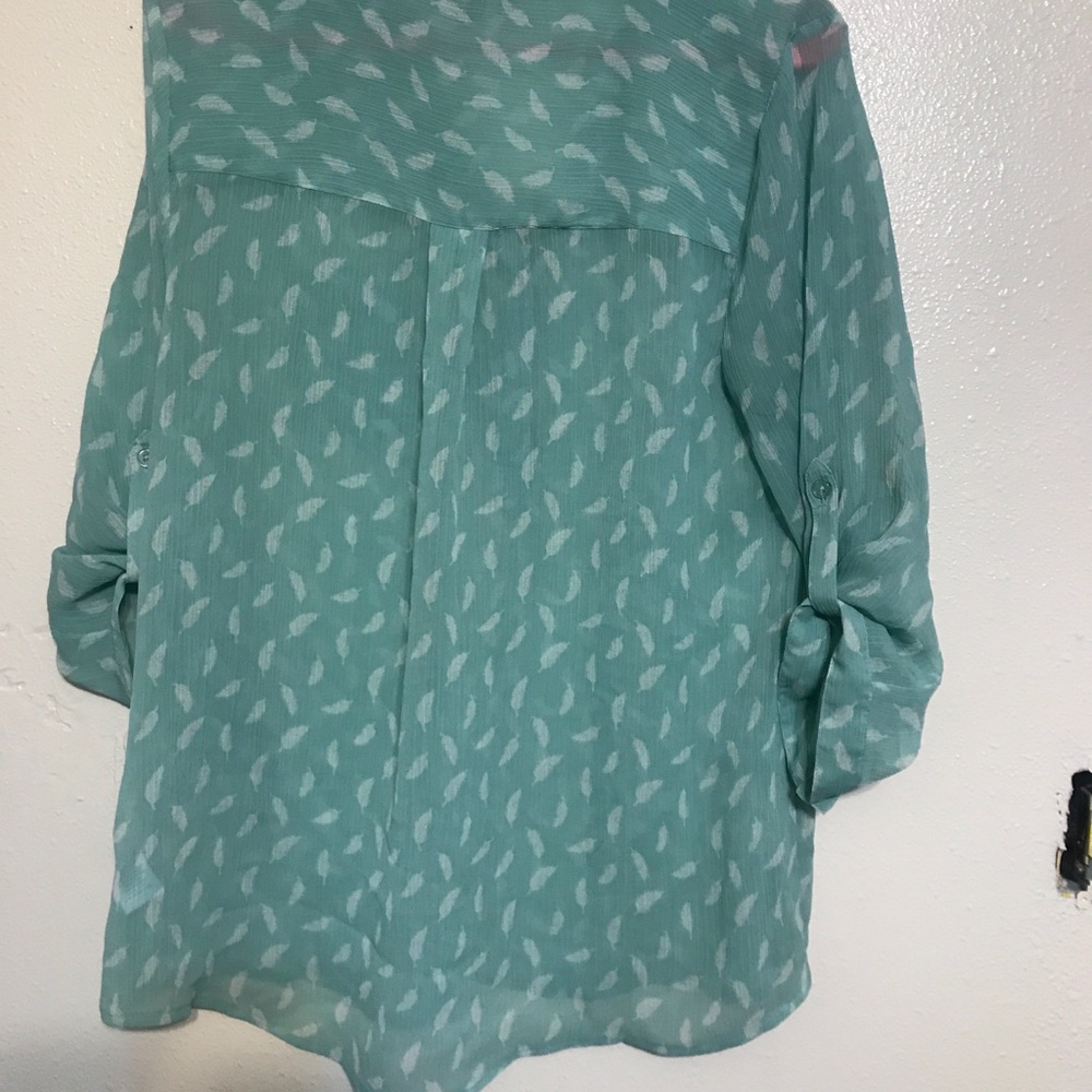 Light green half button up wth white leaves